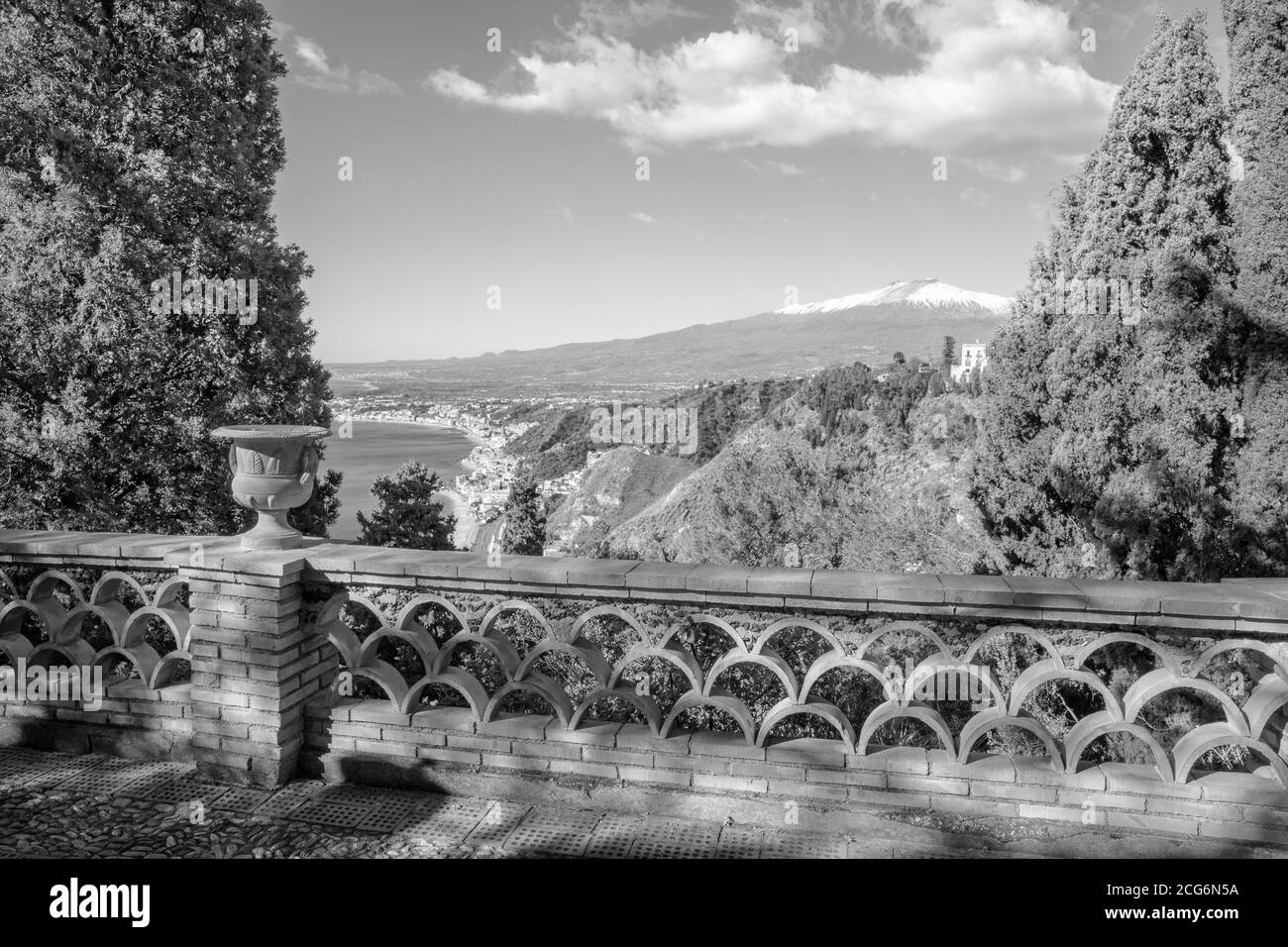 Taormina and Mt. Etna volcano in the bacground from the Public gardens  - Sicily. Stock Photo
