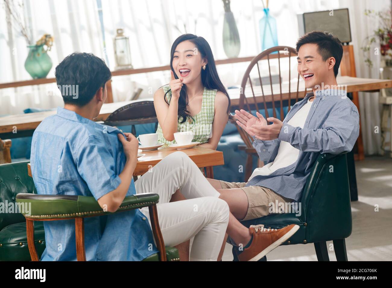 Young friends in a cafe Stock Photo