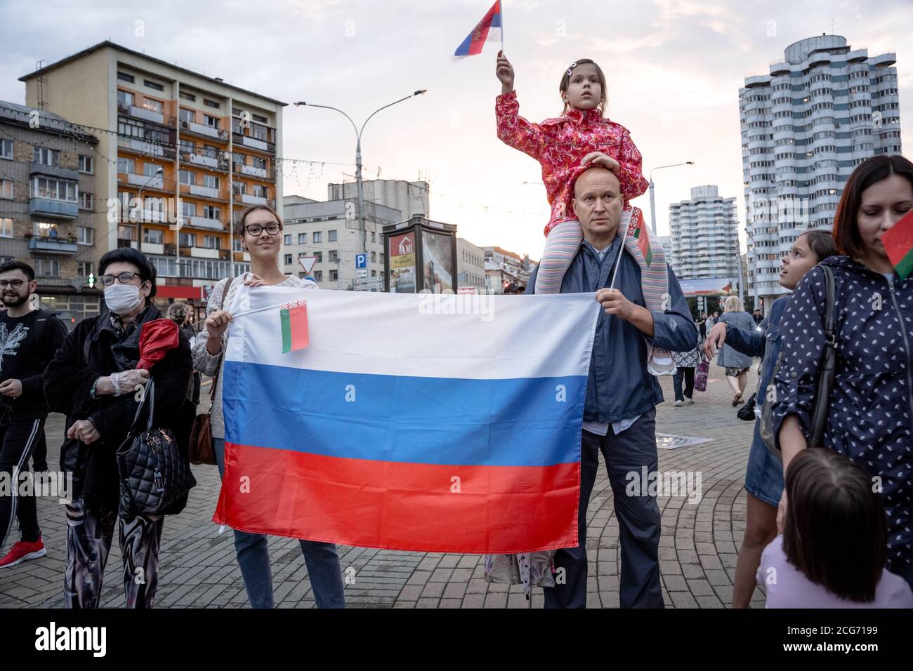 Minsk, Belarus - August 25, 2020: Belarusian people carry flag of Russia in Belarus. Rally in support of the current government Lukashenka Stock Photo