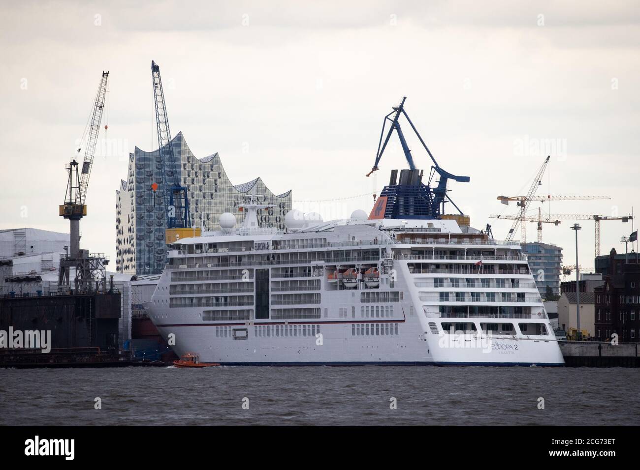 Hamburg, Germany. 07th July, 2020. The cruise liner MS Europa 2 of the Hapag -Lloyd Kreuzfahrten shipping company is moored at a quay of the Blohm Voss  shipyard. Credit: Christian Charisius/dpa/Alamy Live News