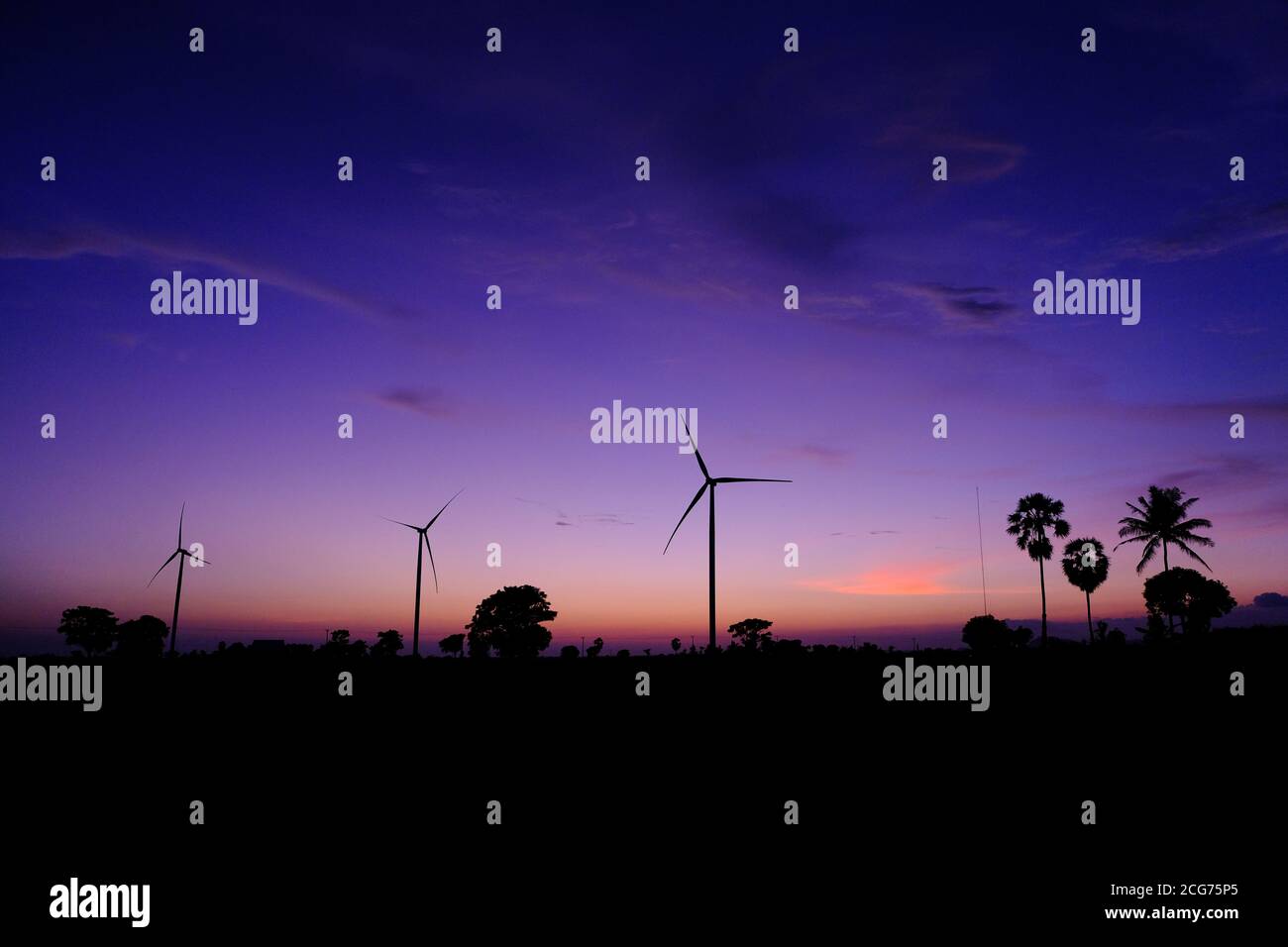 Silhouette of Wind Turbines at sunset, South Sulawesi, Indonesia Stock Photo