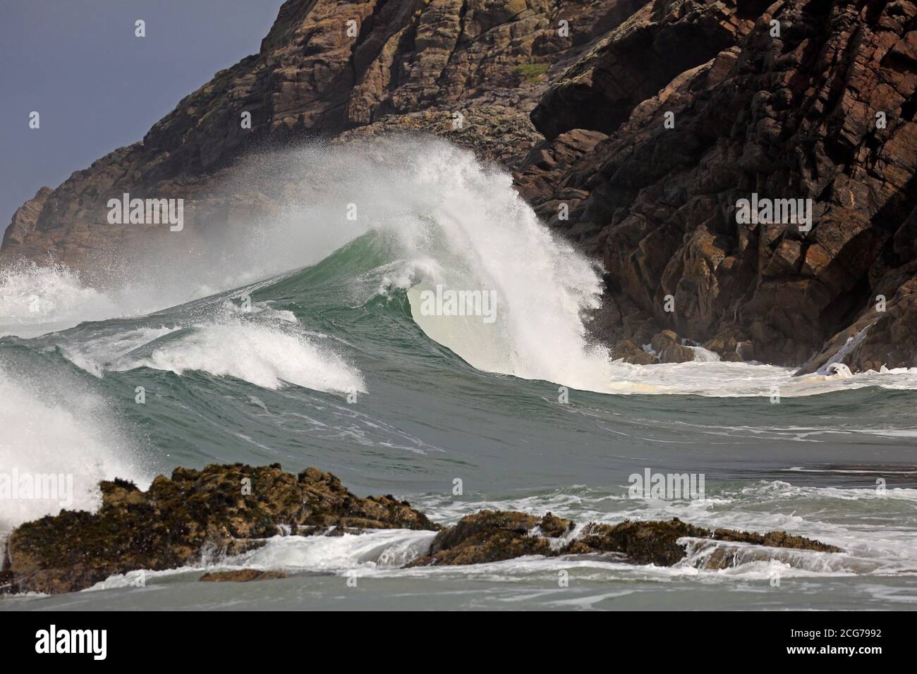 Large storm waves crashing onto rocks in Craimneach Bay Isle of Coll Inner Hebrides, Scotland Stock Photo