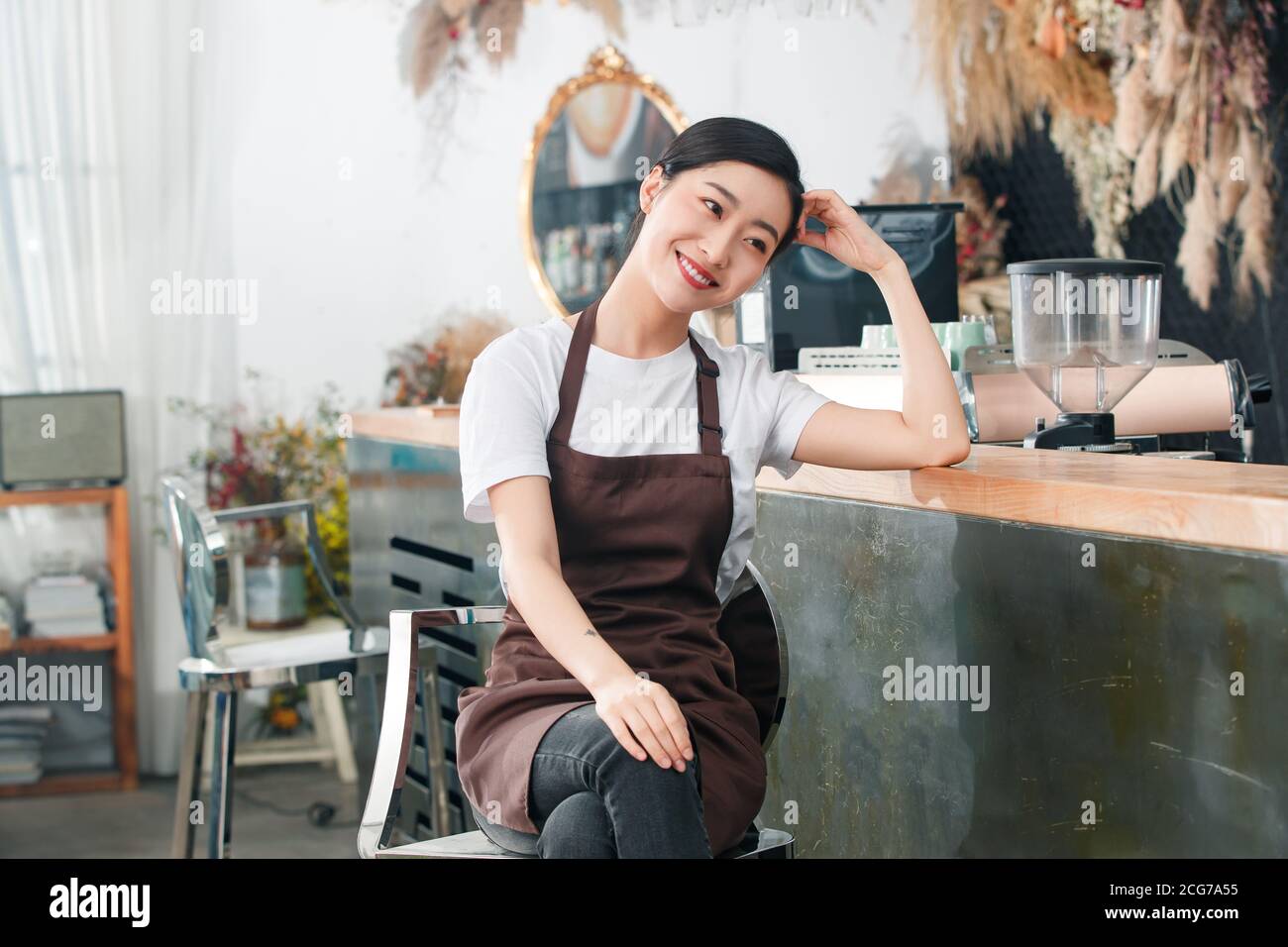Coffee shop attendant to rest Stock Photo