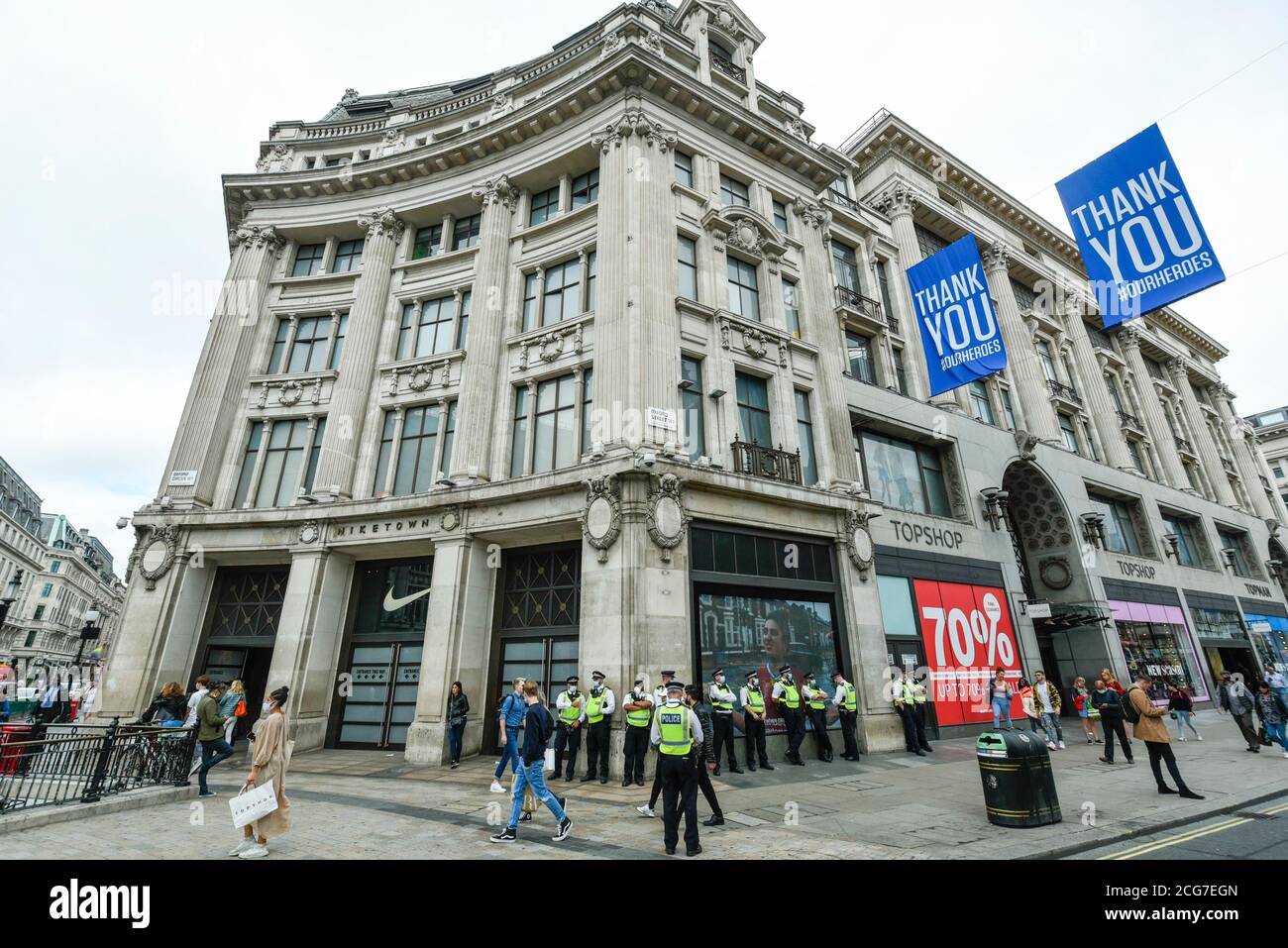 London, UK. 9 September 2020. Police outside Nike Town and Topshop as  activists from Extinction Rebellion (XR) stage a 