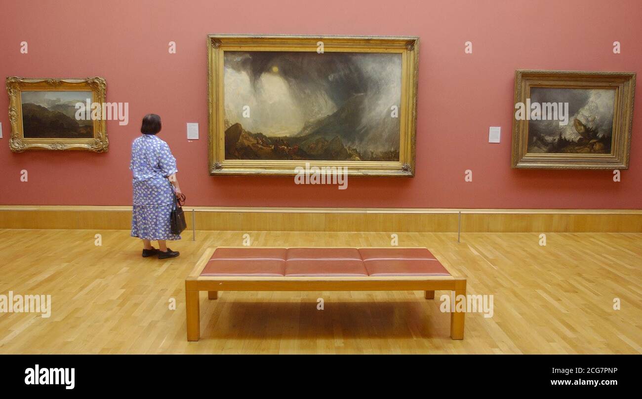 A fan of JMW Turner studies 'Snow Storm' (centre), which shows Hannibal