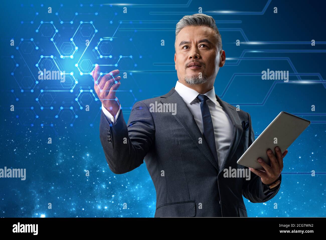 Holding a tablet business man Stock Photo