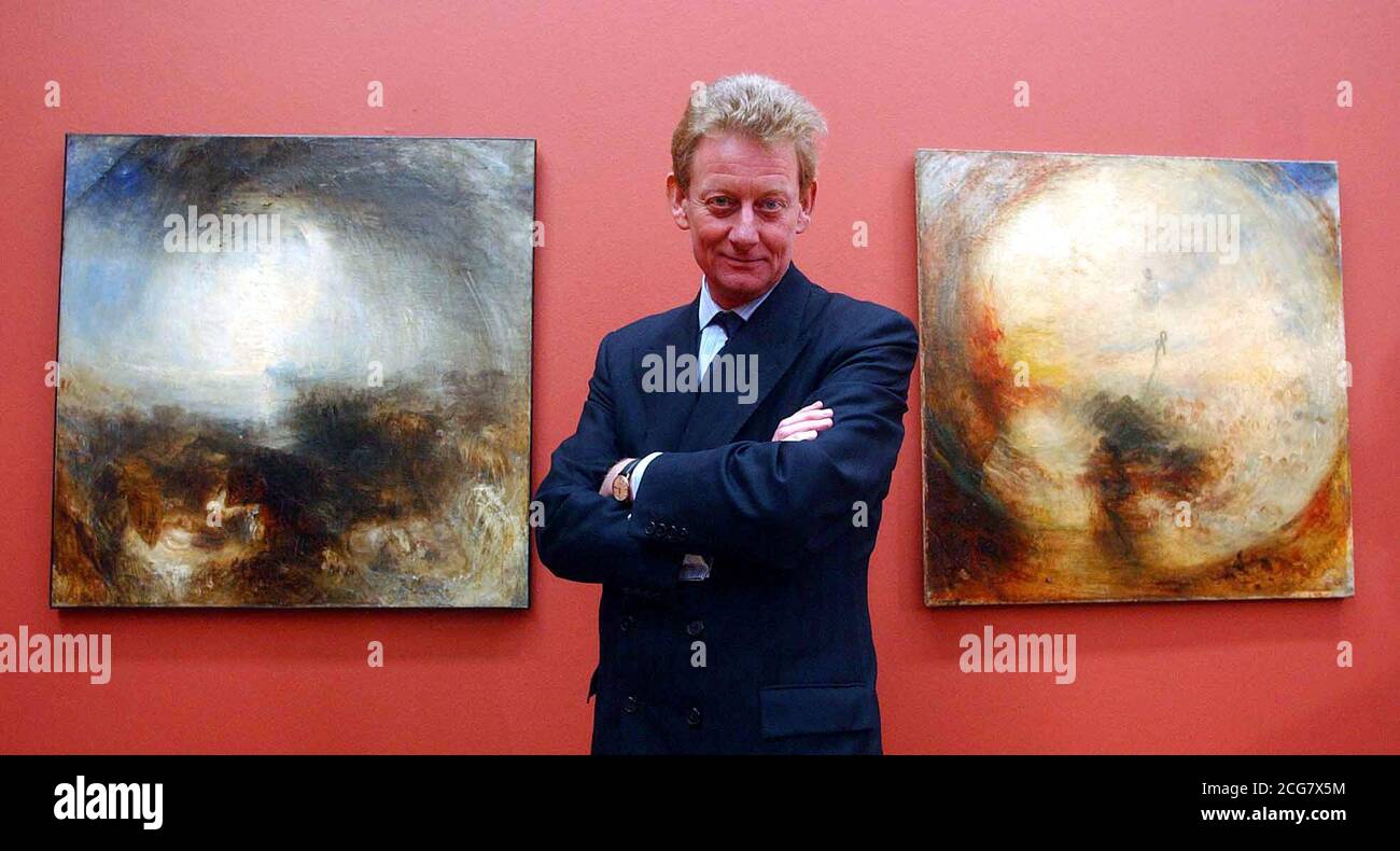 David Verey the Chairman of the Tate trustees, stands in front of the two paintings by JMW Turner, which were stolen from an exhibition in Frankfurt, Germany in July 1994, at the Tate Britain gallery in Central London. * The Tate spent 3.5 million tracking down the works - entitled Shade And Darkness: The Evening Of The Deluge and Light And Colour (Goethe's Theory), right,: The Morning after the Deluge - using part of the 24 million insurance payout it received for the loss of the collection. The public will get their first glimpse of the works tomorrow after they were found without their Stock Photo