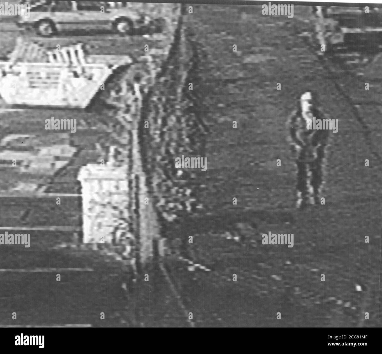 Scotland Yard collect photo issued 8/4/03 of a suspect at the car yard in Edmonton linked with Real IRA bombing outside the BBC Television centre. * Three Irish terrorists were convicted at the Old Bailey of plotting a Real IRA bombing campaign in mainland Britain - endangering life and severely damaging property. They were frontliners in a conspiracy responsible for car bomb attacks on three busy centres on Saturday nights during 2001. The first was on the BBC Television centre in March, then in Ealing Broadway, west London, in August and finally in Smallbrook, Queensway, Birmingham in Stock Photo