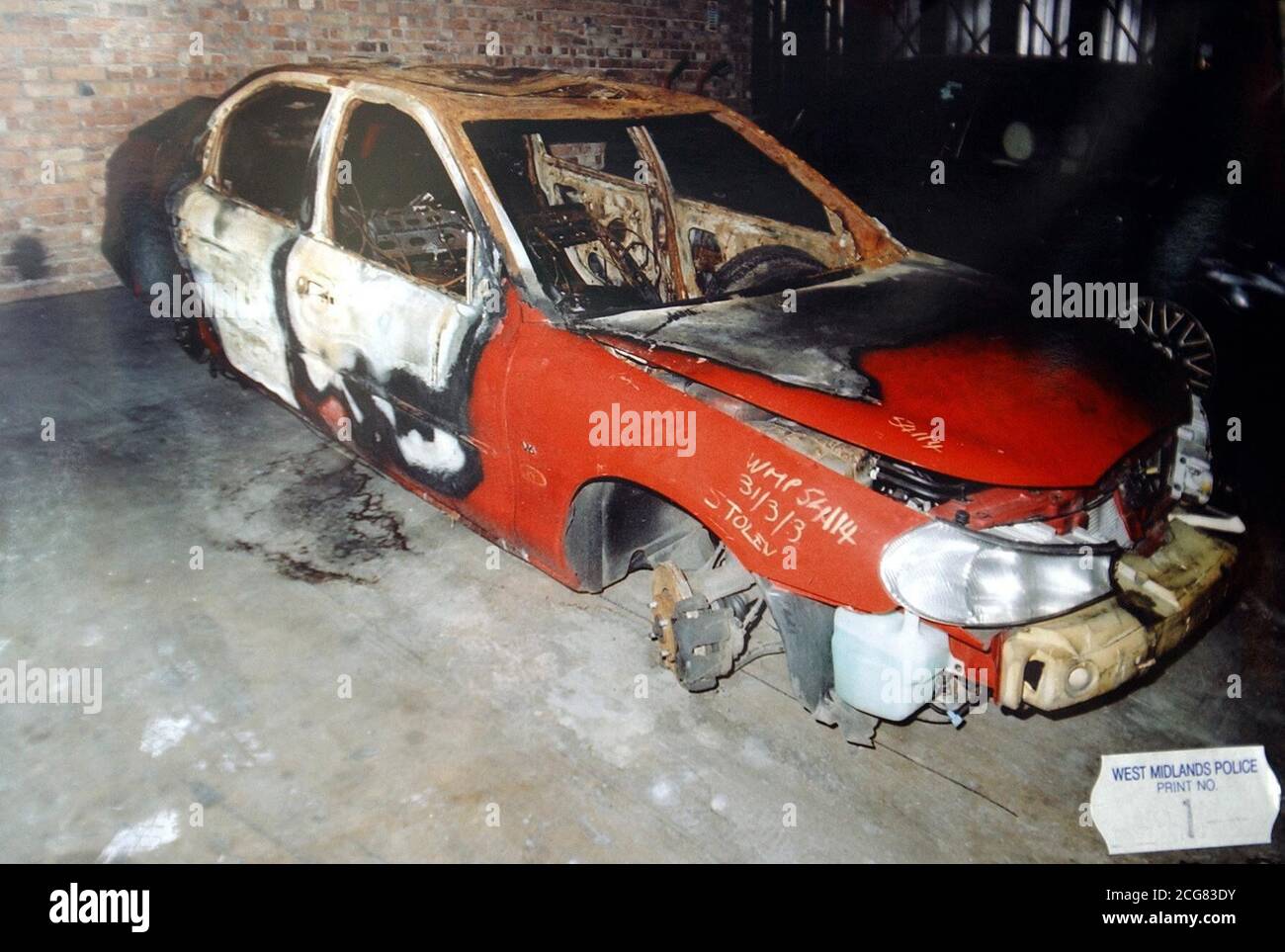 Collect image of the car used by the gunmen who murdered the two teenage friends Letisha Shakespeare, 17, and Charlene Ellis, 18, in Birmingham on January 2 as they celebrated at New Year.   * The red Ford Mondeo has been recovered, it has been revealed by the detective leading the investigation. Detective Superintendent Dave Mirfield, of West Midlands Police, said the burnt-out red Ford Mondeo was found with two shell casings used in the weapon which shot dead the two girls. Stock Photo