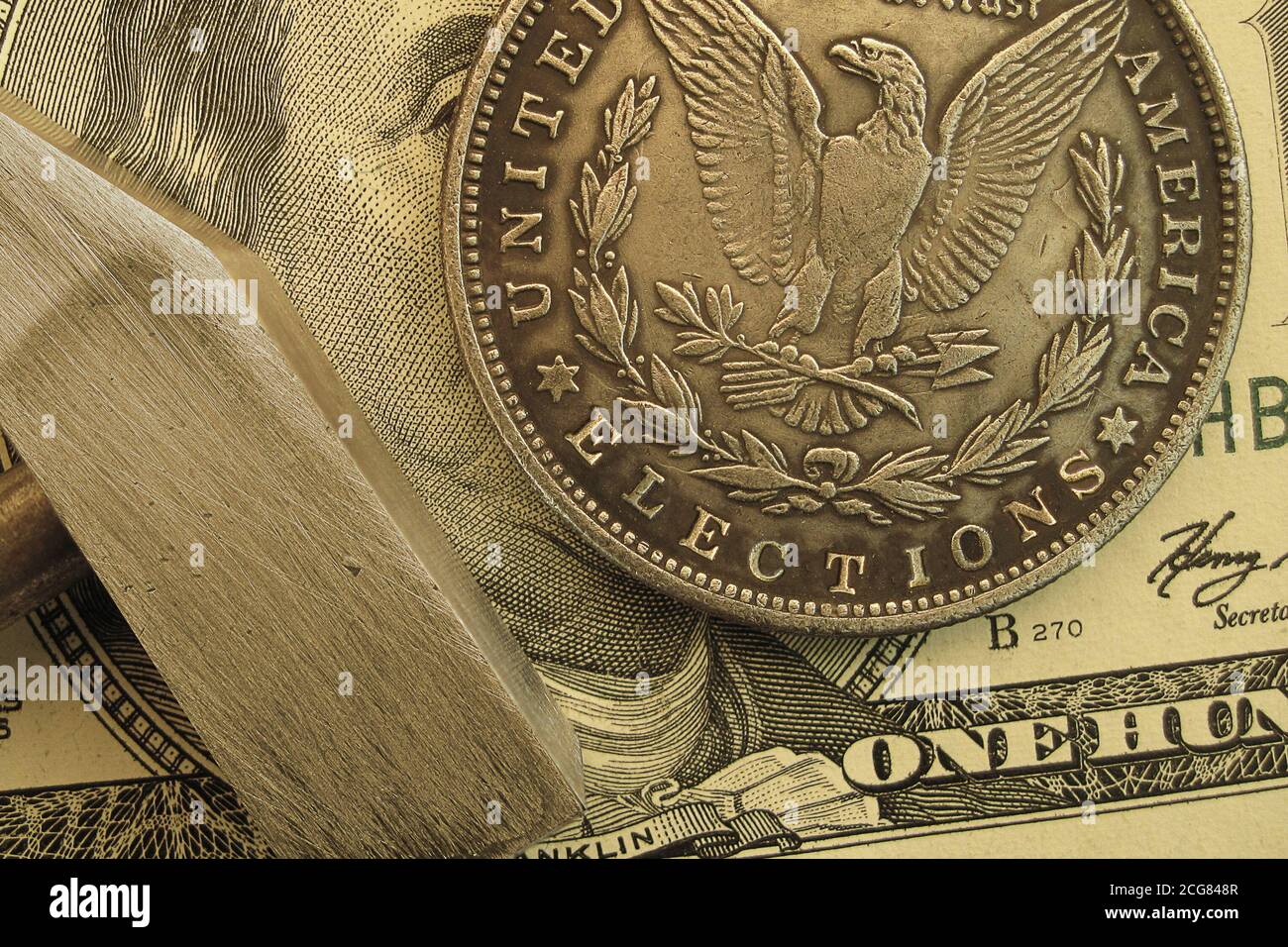 An American dollar coin with a graving text Elections. Voting campaign concept Stock Photo