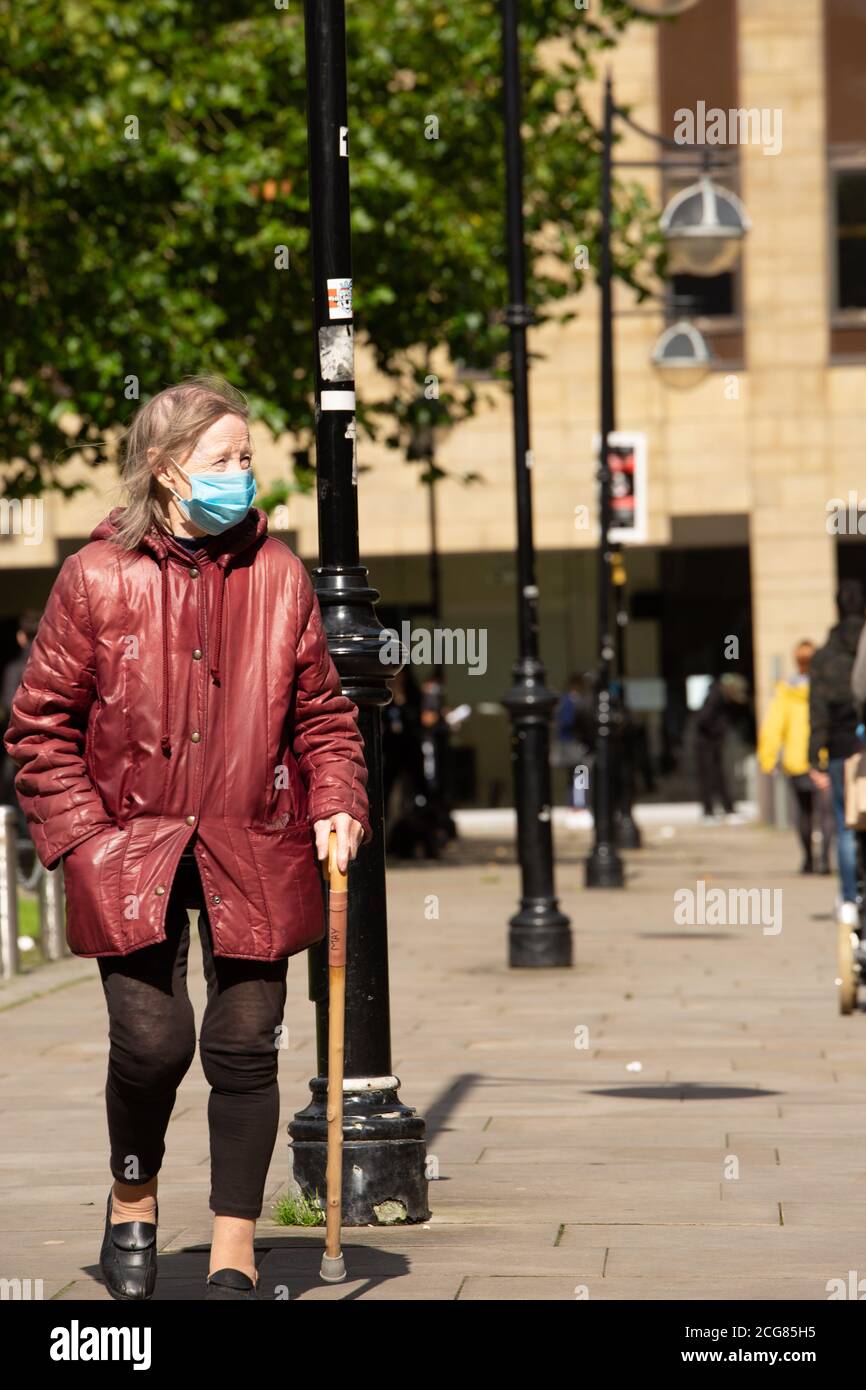 Bolton City Centre during new lockdown rules, people with face masks in Bolton city centre Stock Photo