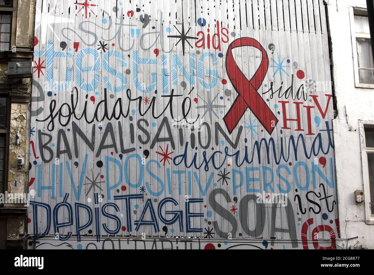 A huge wall used as a street mural calling for the urgent need to stop ...