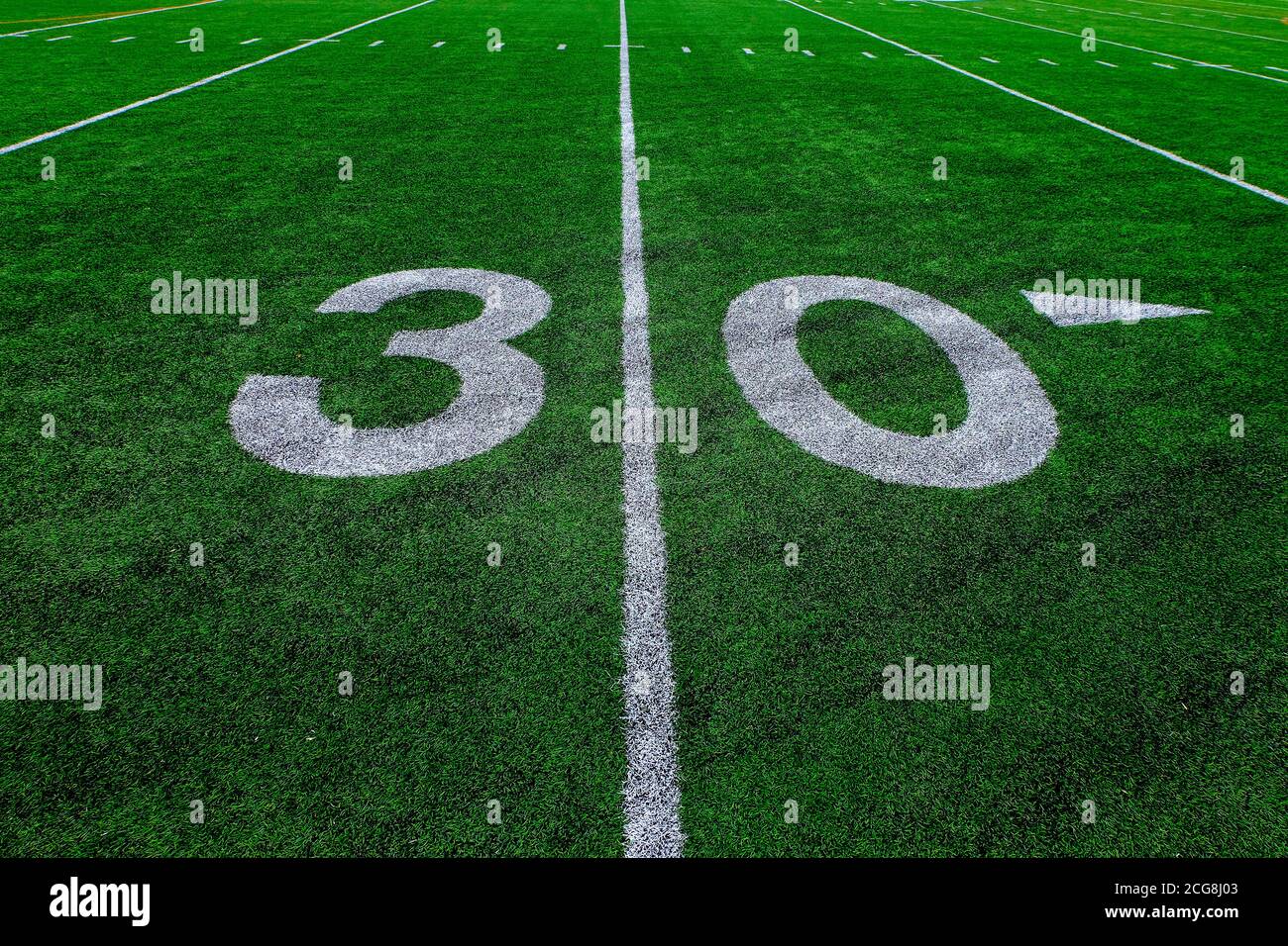 Football field green grass white yard markers to touchdown competition game Stock Photo Alamy