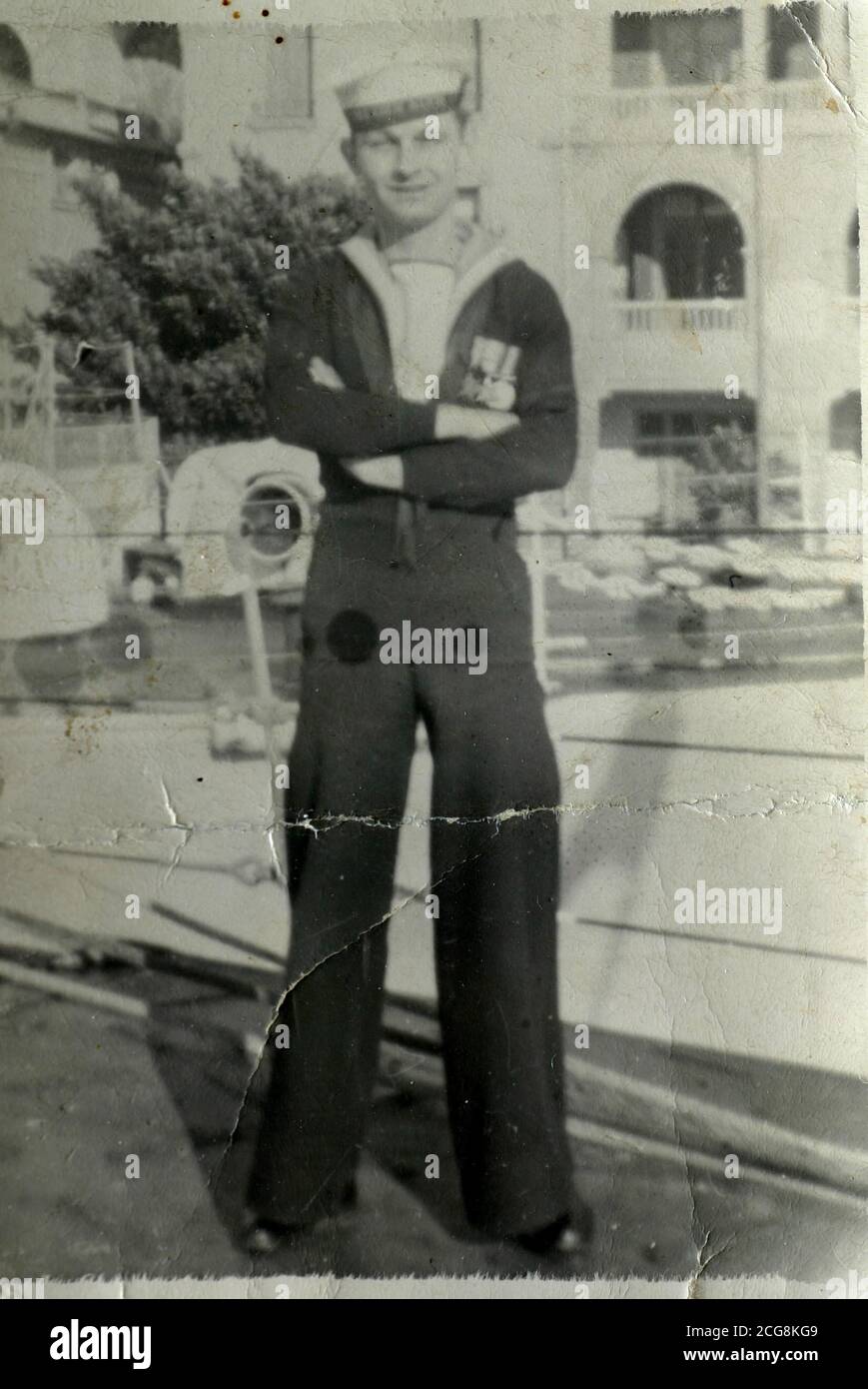 War time collect photo of D-Day veteran Clifford Brown from Swanage in Dorset who survived the assault on Omaha Beach in Normandy by digging a hole in the sand. Mr Brown was only 17 when his landing vessel was hit by shells and he was washed onto the beach during the D-Day landings on June 6, 1944. He was stranded for eight hours while the American forces battled for control of the beachhead. Mr Brown, 77, worked as a leading stoker in the engine room of a British minesweeper but had been transferred onto a landing craft to help as it came under heavy enemy fire. Stock Photo