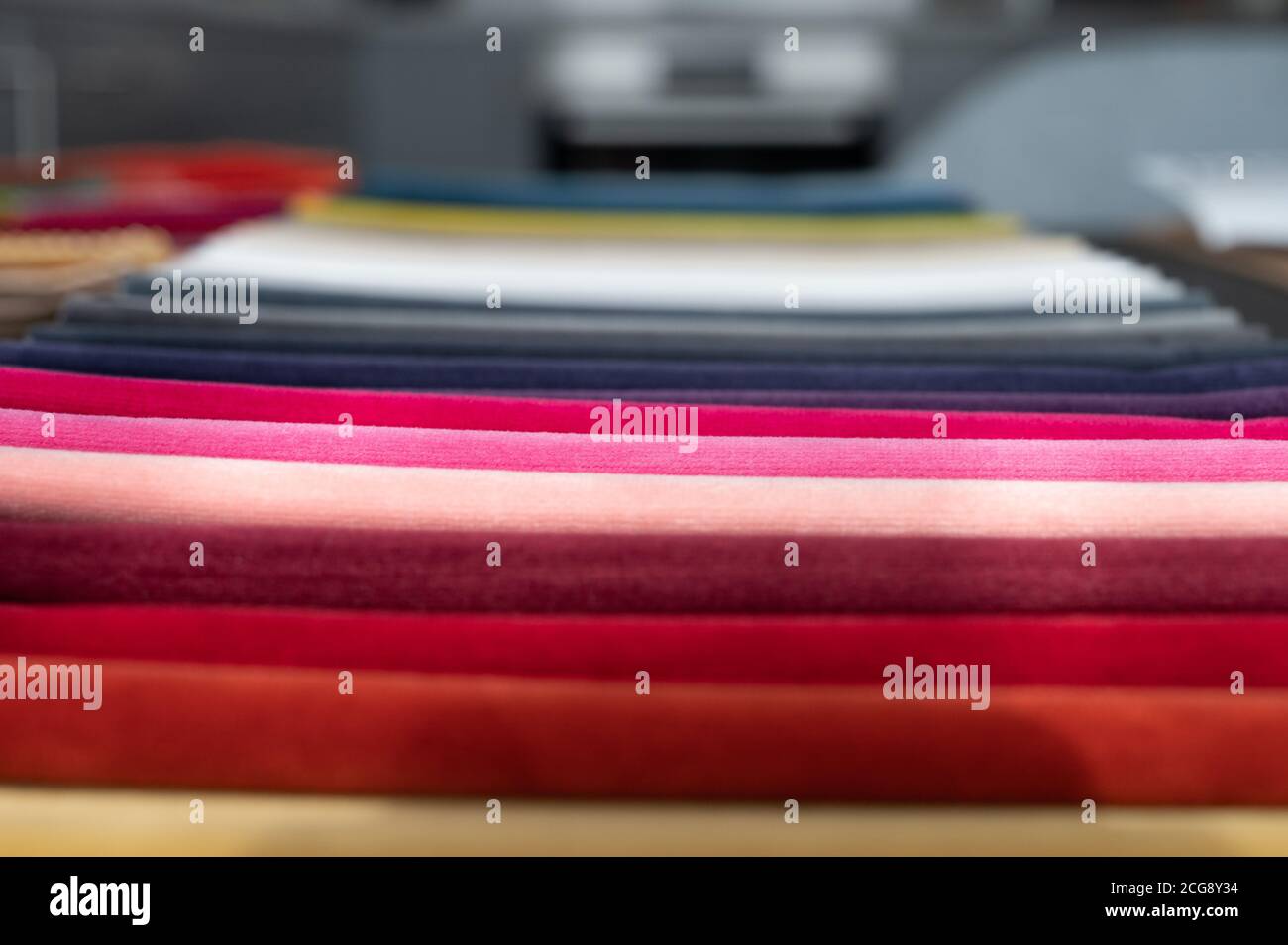 Folded soft luxury velvet samples in gradient colors Stock Photo