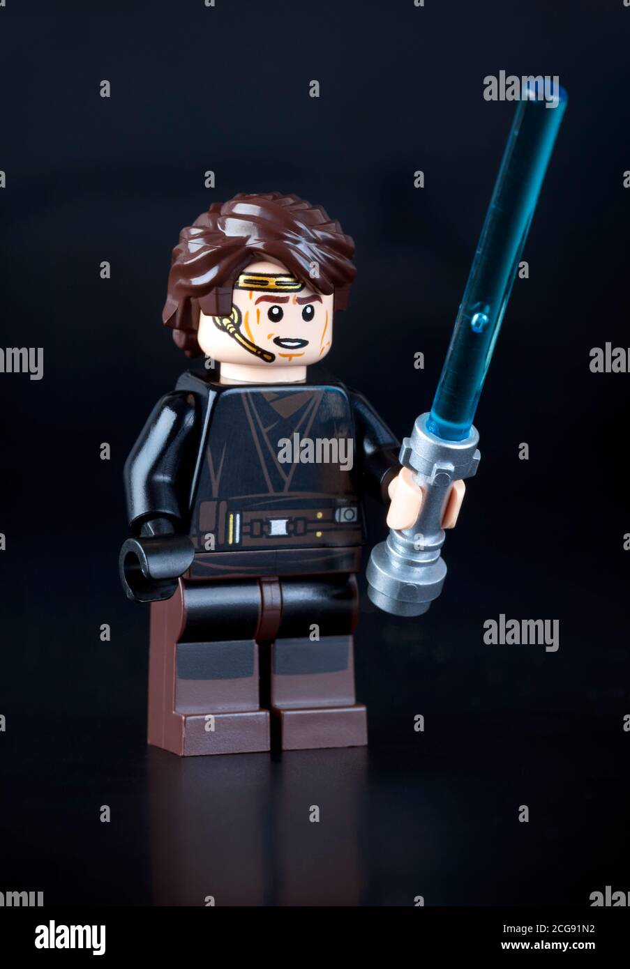 Tambov, Russian Federation - June 21, 2014 Lego Anakin Skywalker Minifigure with lightsaber on black background. Studio shot. Stock Photo