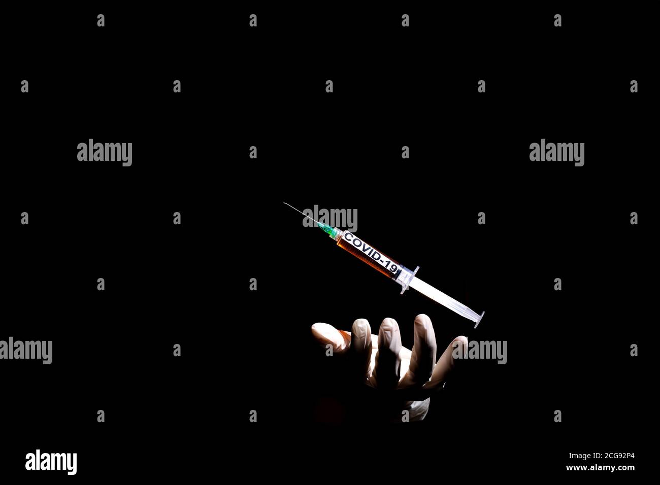 covid 19 vaccine syringe on black background vaccine concept Stock Photo