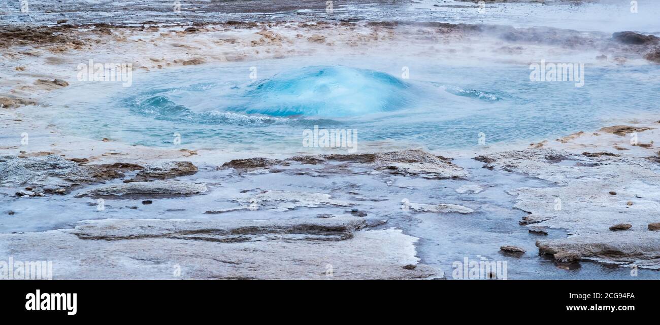 Initial start of a giant geyser in detail, Iceland. Stock Photo