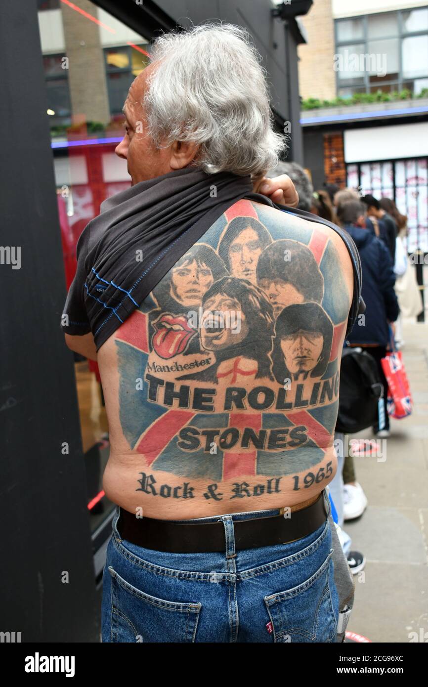 London, UK - 9 September 2020 Fan with Rolling Stones tattoo at opening of The  Rolling Stones RS No. 9 Carnaby store. Rock'n'roll legends The Rolling  Stones officially open world-first flagship store