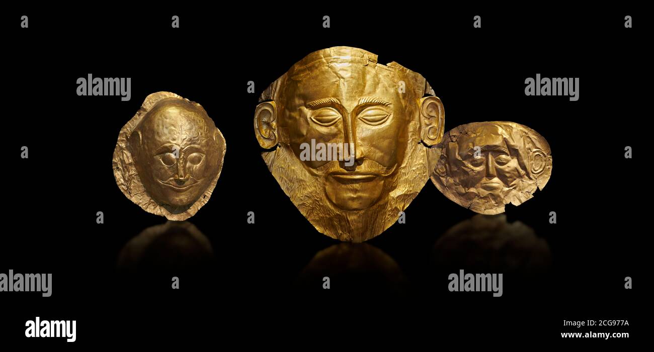 Mycenaean gold death masks from Grave Circle A, centre mask of Agamemnon, Mycenae, Greece. National Archaeological Museum of Athens.  Black Background Stock Photo