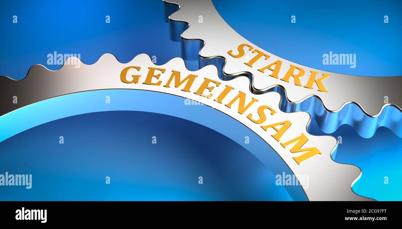 Concept: Phrase 'strong together' in German language on gears fitting into each other. Metaphor Stock Photo