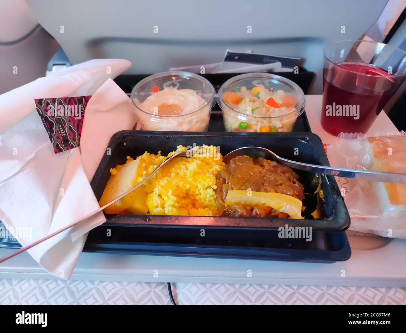 DOHA, QATAR - MARCH 4, 2020: Economy class set meal on Qatar Airways flight from Doha to Casablanca, Morocco Stock Photo