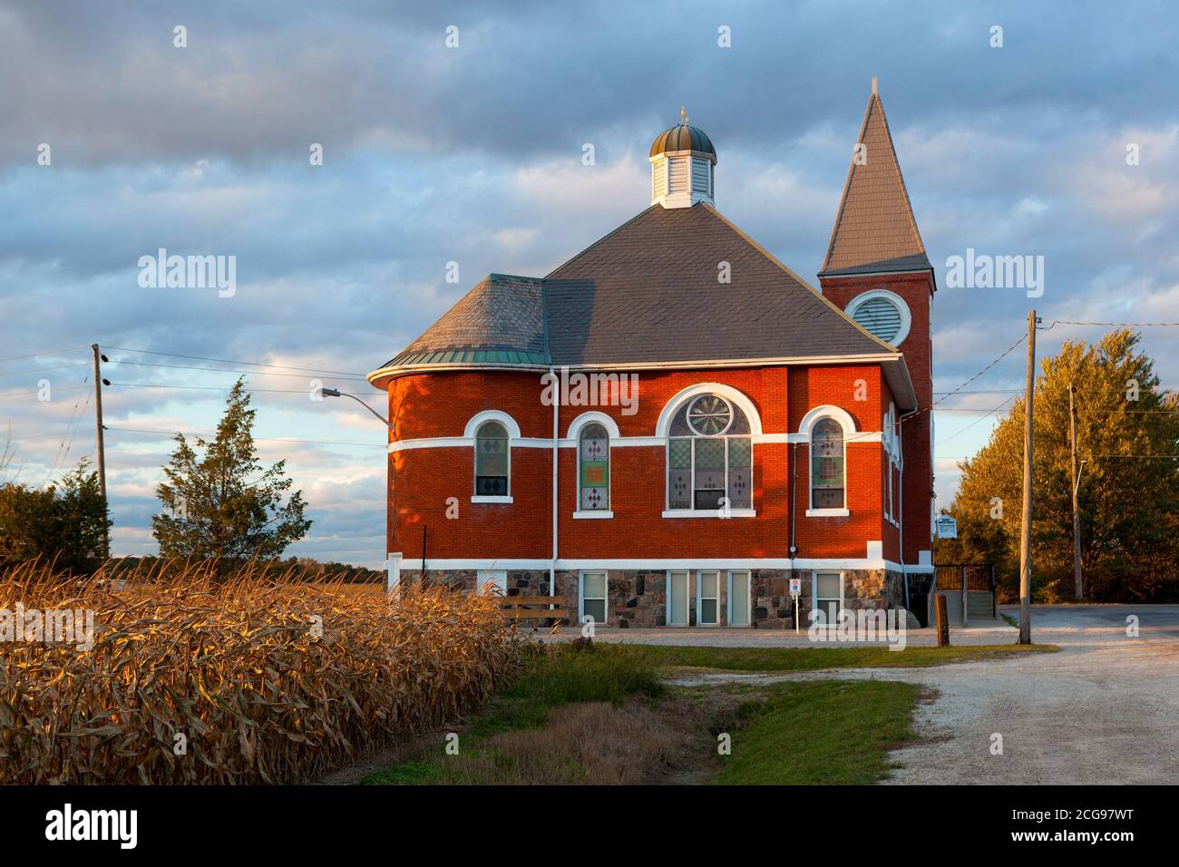 An Exterior scenic View of a red Rural Church located in Wheatley, Ontario Stock Photo