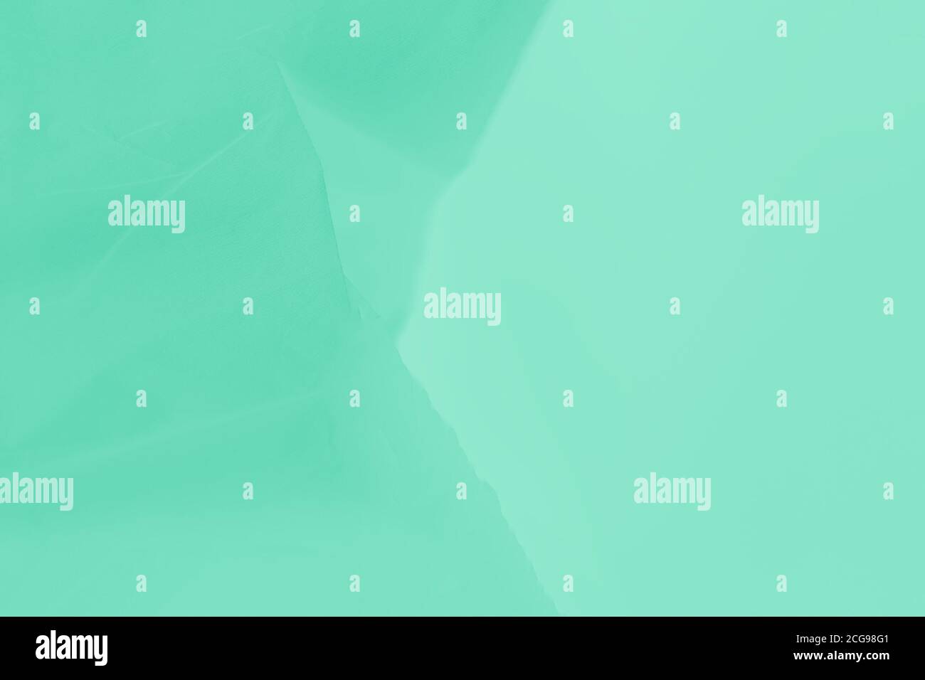 Soft light green flowing fabric, gradient green color background Stock Photo