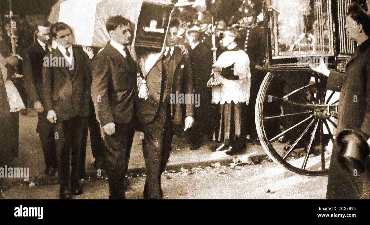 1920 - The remains of Alderman Terence MacSwiney (Died Oct 25) , Sinn Fein activist being repatriated to Cork after dying in prison during a hunger strike.Terence James MacSwiney aka  Toirdhealbhach Mac Suibhne; (1879 –  1920) was an Irish author, playwright,  and politician who became Sinn Féin Lord Mayor of Cork during the Irish War of Independence in 1920 before being arrested by the British government  under the Defence of the Realm Act . He died in Brixton Prison  after 74 days on hunger strike. Stock Photo