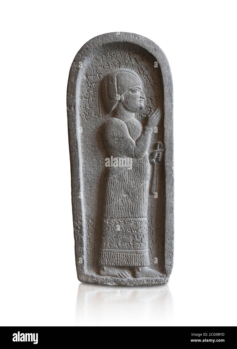 Neo Hittite basalt funerary stele from Neirab or Tell Afis, Syria, 7th cent BC. Louvre Museum. White background Stock Photo