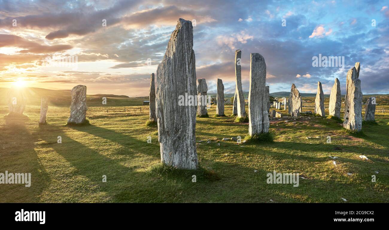 Panorama of the central stone circle, at sunset, erected between 2900-2600BC measuring 11 metres wide. At the centre of the ring stands a huge monoli Stock Photo