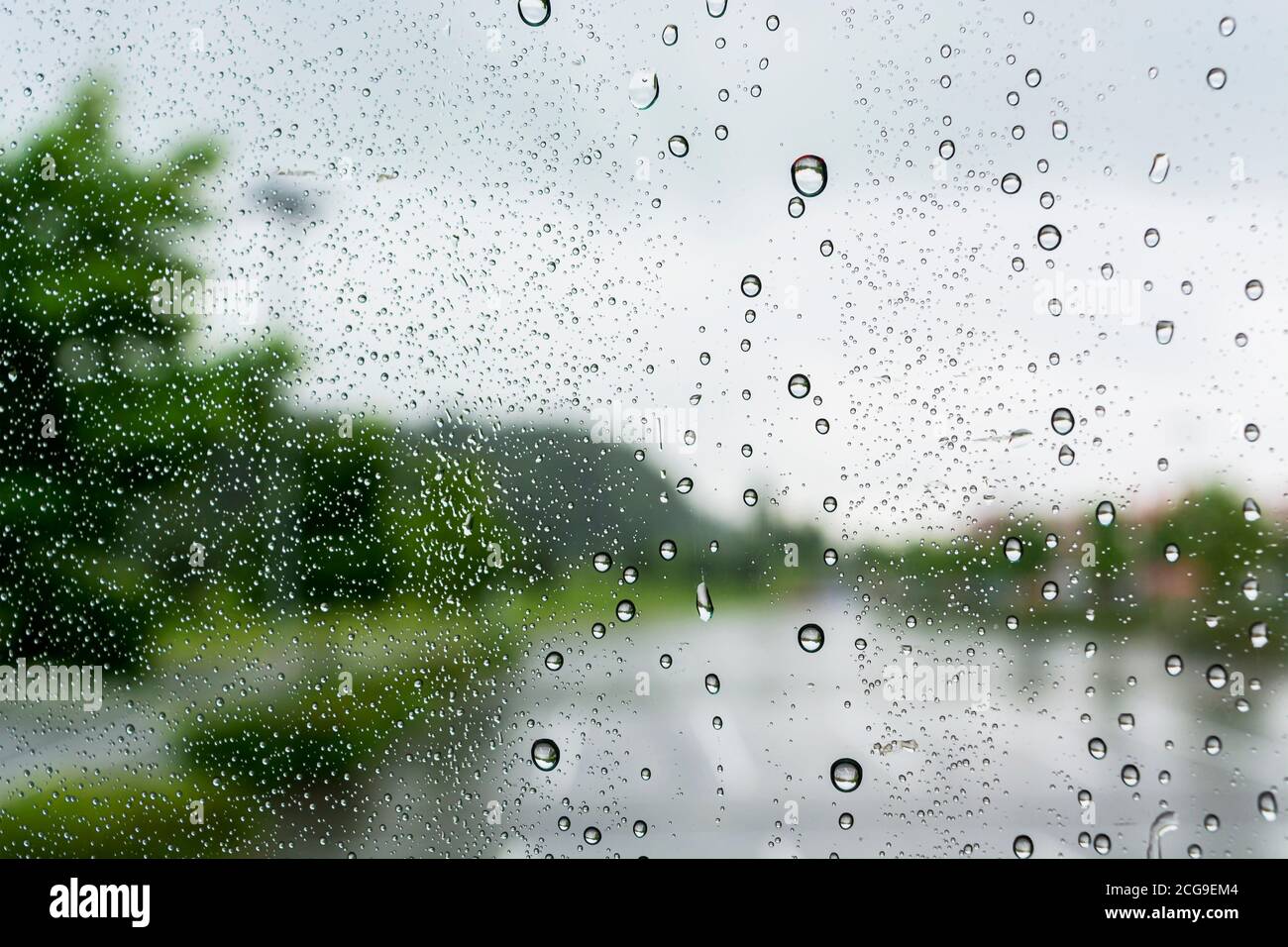 drops of water on the glass on a rainy day, glass with drops of water ...