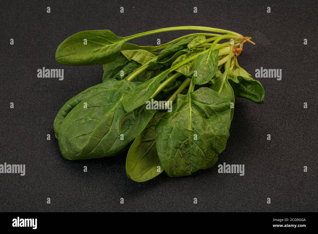 Vegan cuisine - Fresh green Spinach leaves heap Stock Photo - Alamy