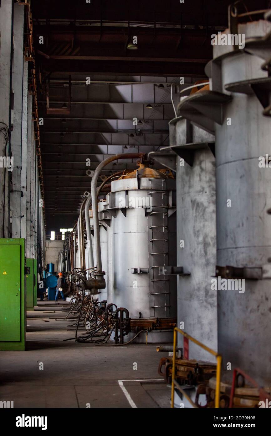 Titanium metallurgy factory workshop. Vacuum furnaces for melting metallic titanium. Stock Photo