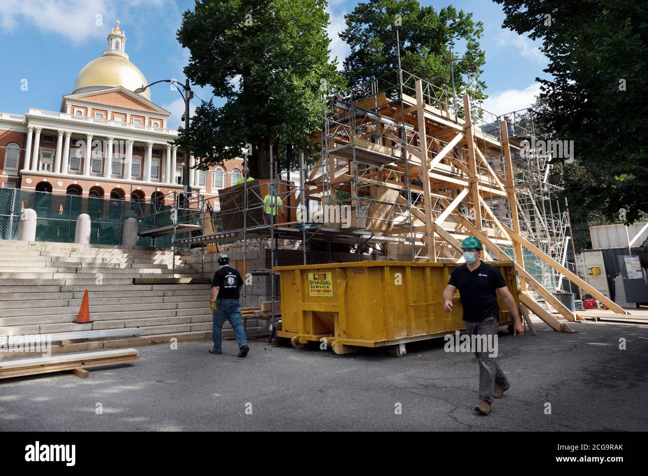 Removal for off site restoration of the historic Shaw 54th Memorial bronze relief outside the Statehouse in Boston, Massachusetts, USA Stock Photo