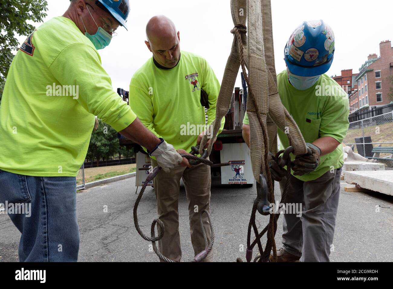 Removal for off site restoration of the historic Shaw 54th Memorial bronze relief outside the Statehouse in Boston, Massachusetts, USA Stock Photo