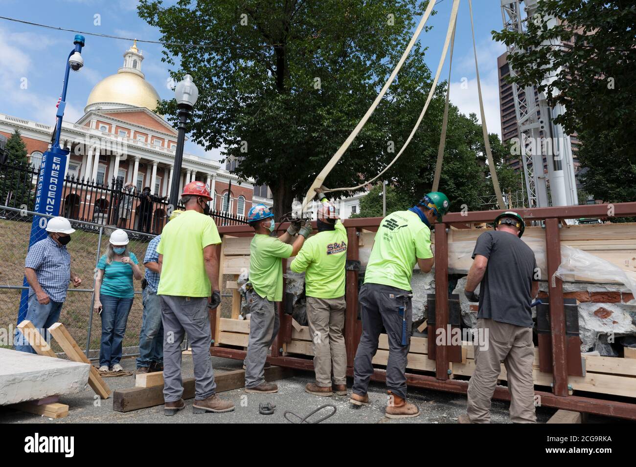 Removal for off site restoration of the historic Shaw 54th Memorial bronze relief outside the Statehouse in Boston, Massachusetts, USA Stock Photo
