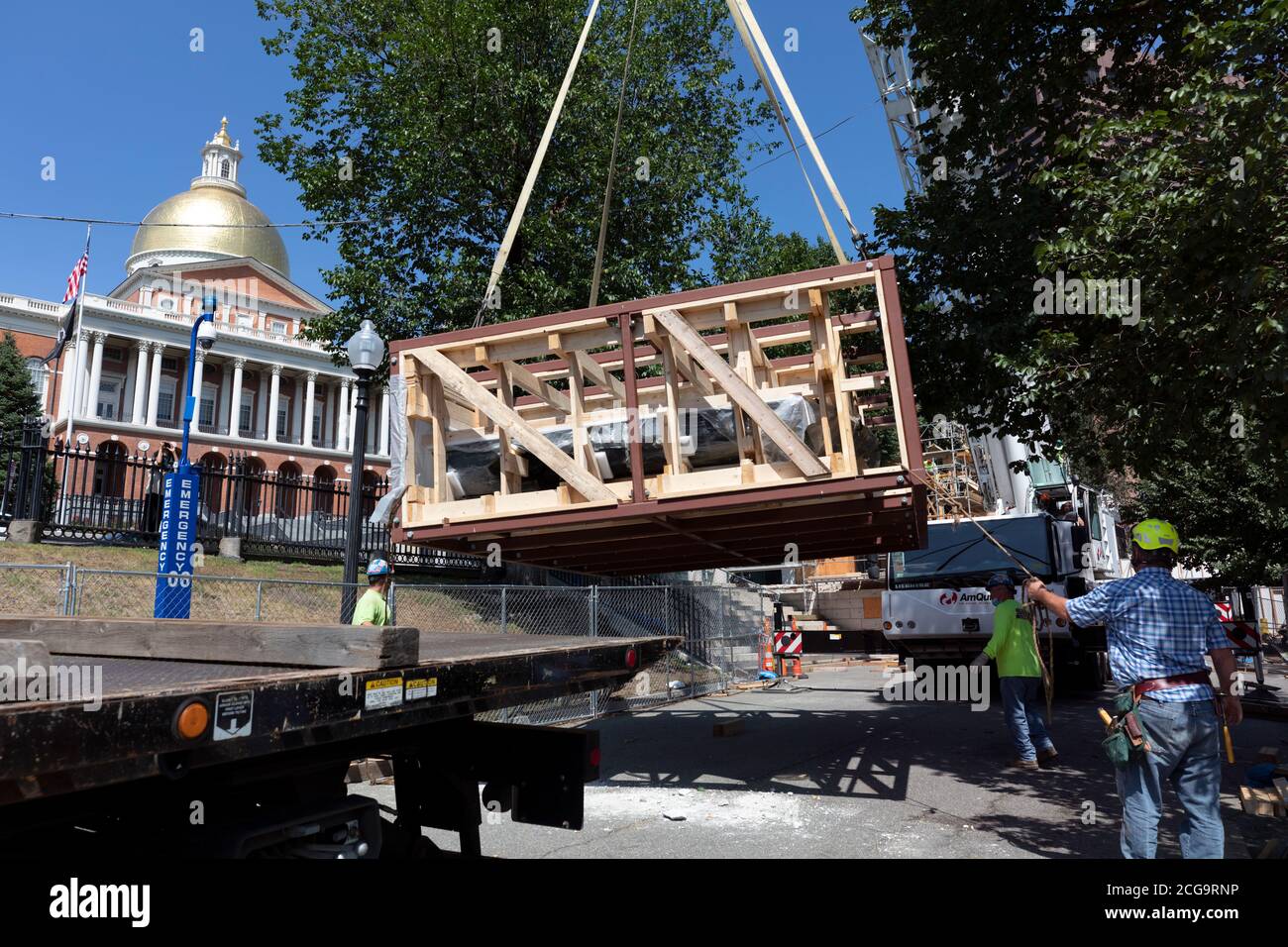 Removal for off site restoration of the historic Shaw 54th Memorial bronze relief outside the Statehouse in Boston, Massachusetts, USA Stock Photo