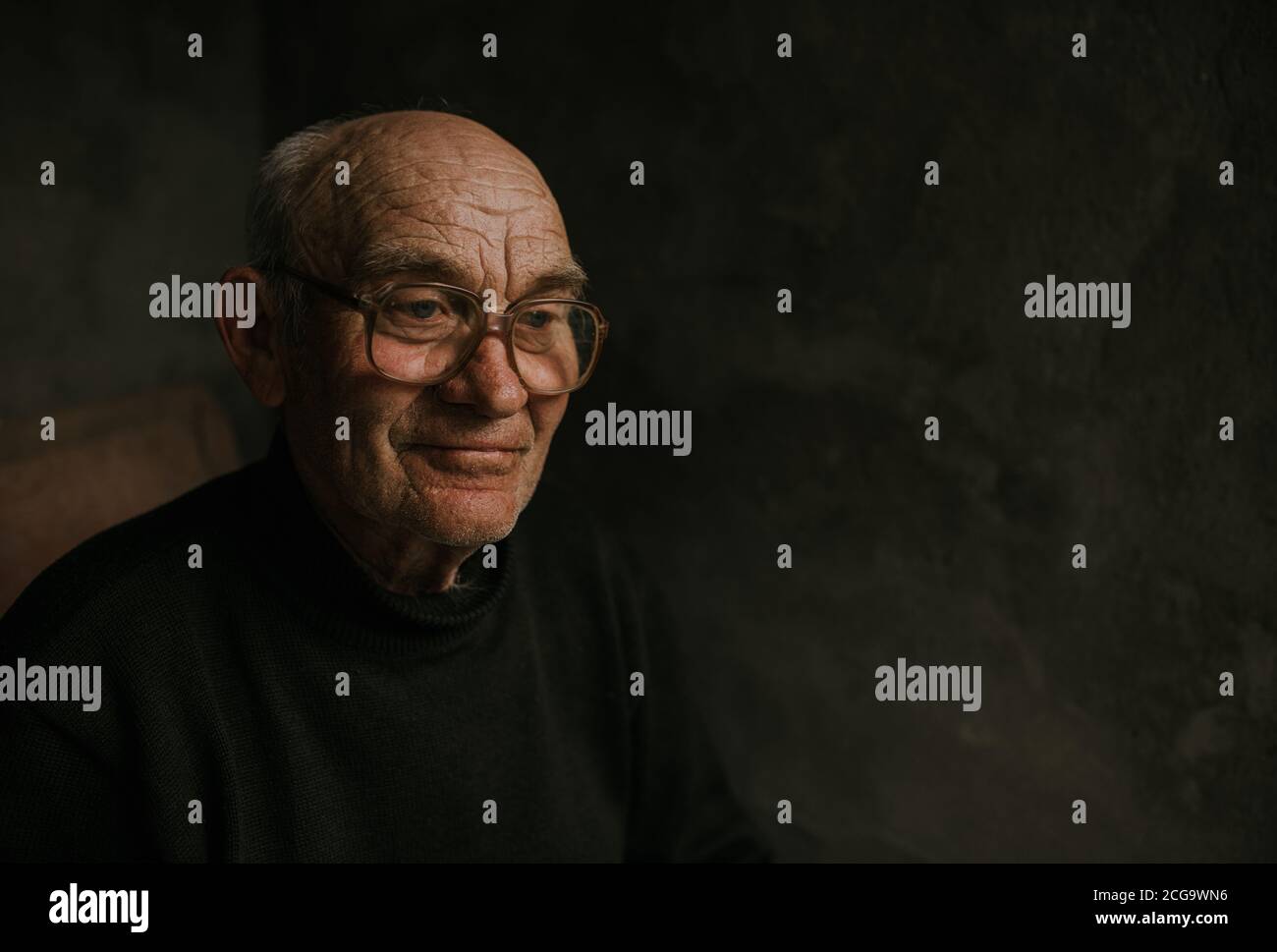 Man in glasses looks pensive hi-res stock photography and images - Alamy