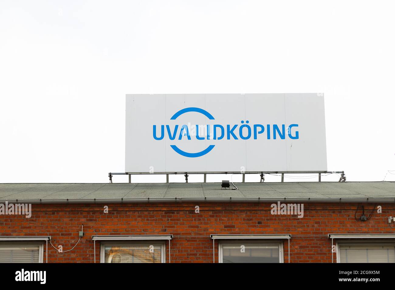 Lidkoping, Sweden - June 24, 2020: Roof top sign for the UVA Lidkoping a worldwide leading global supplier of high precision grinding machines. Stock Photo