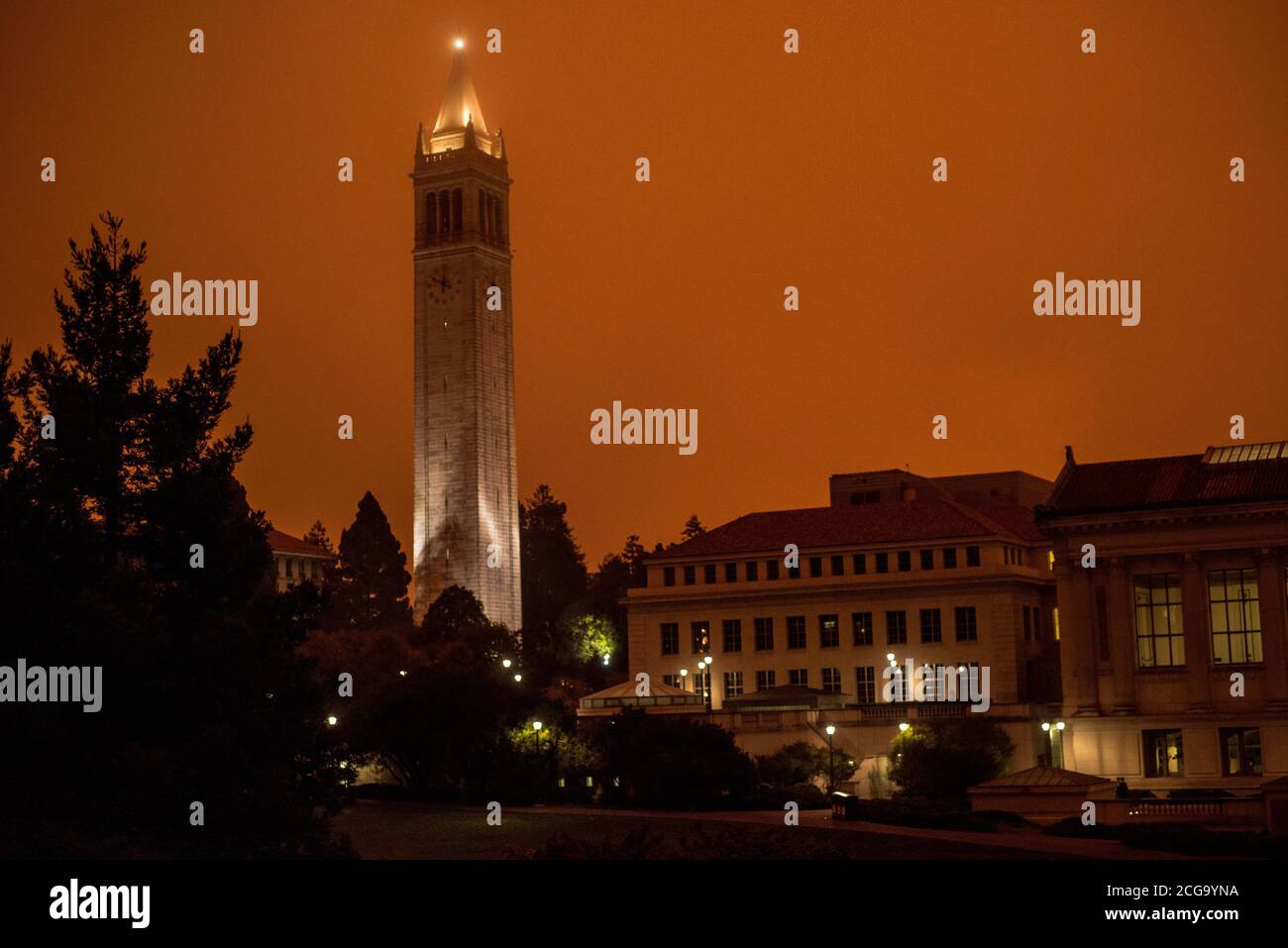 The Campanile clock tower on the campus of UC Berkeley, taken at 10 AM when smoke from the California wildfires filled the air with smoke and smog. Stock Photo