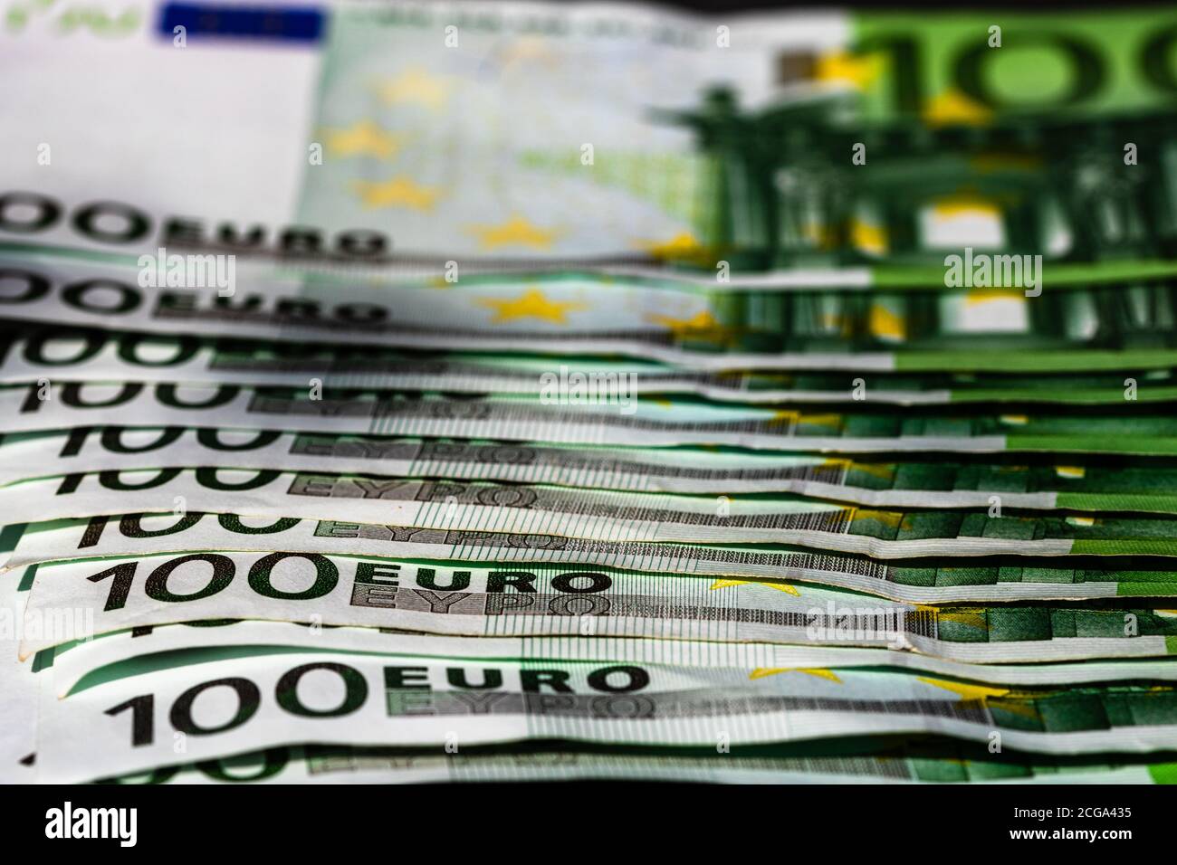 Selective focus on detail of euro banknotes. Close up macro detail of money banknotes, 100 euro isolated. World money concept, inflation and economy c Stock Photo