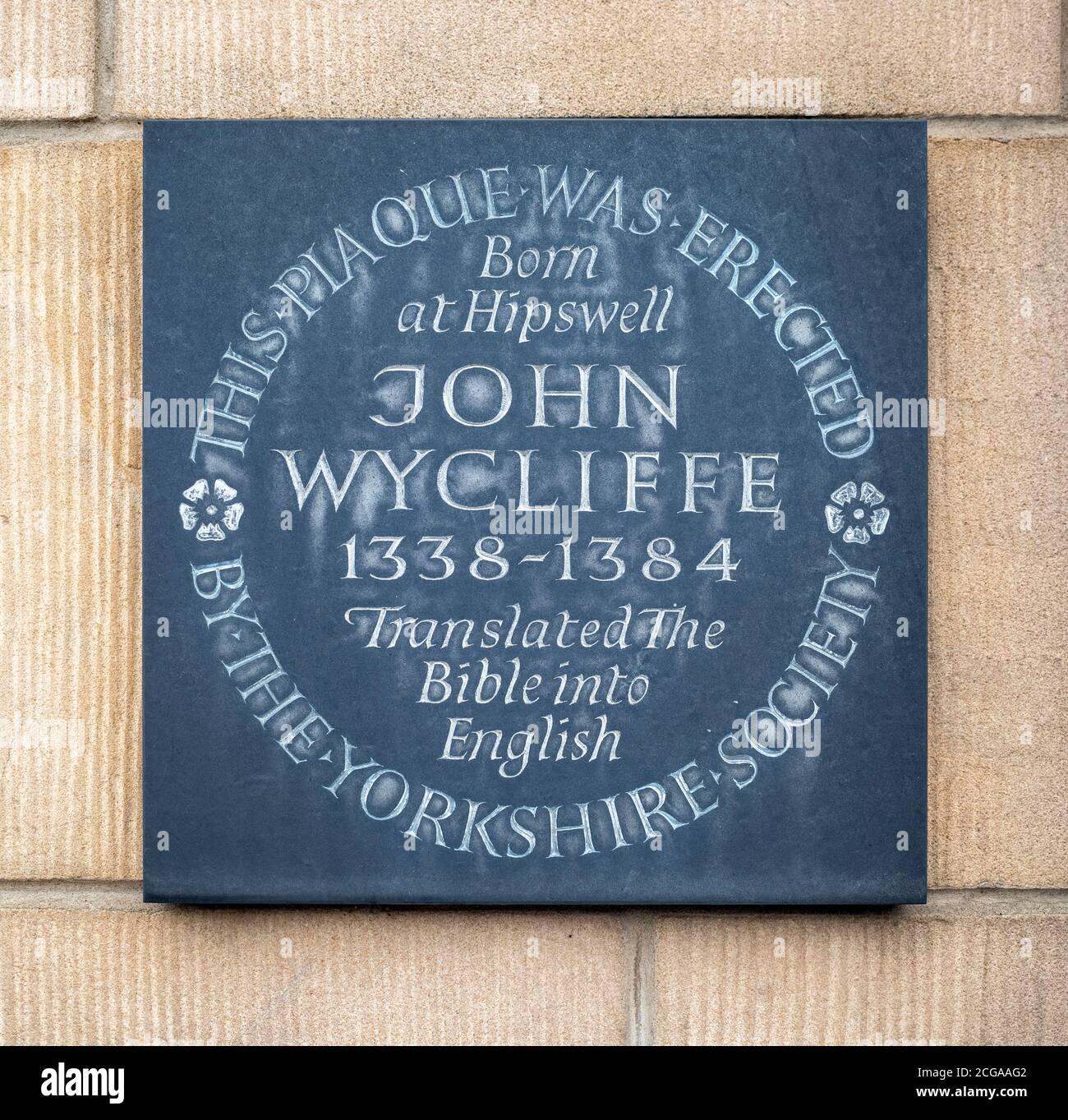 Plaque commemorating John Wycliffe, English scholastic philosopher, theologian, biblical translator, reformer, priest, and a seminary professor at the Stock Photo