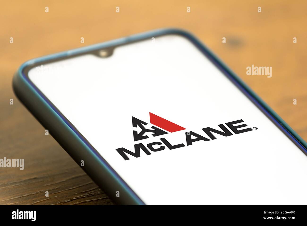 In this photo illustration the McLane Company logo displayed on a