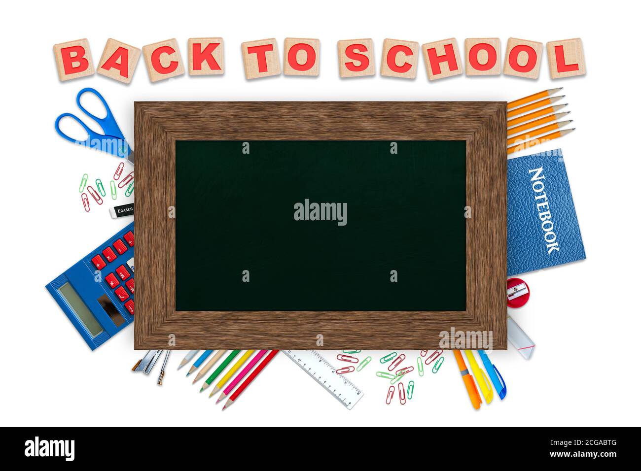 Back to school alphabet blocks, concept of education with stationery and chalkboard copy space on top isolated on white background. Stock Photo