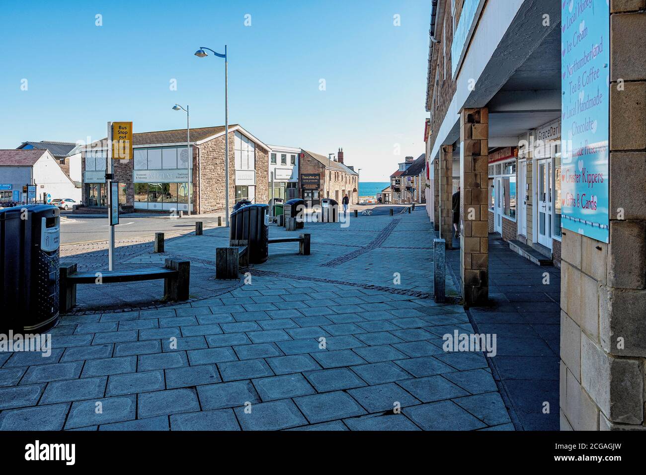 Main Street through Seahouses coastal village. classed as the gateway to Northumberland. Stock Photo