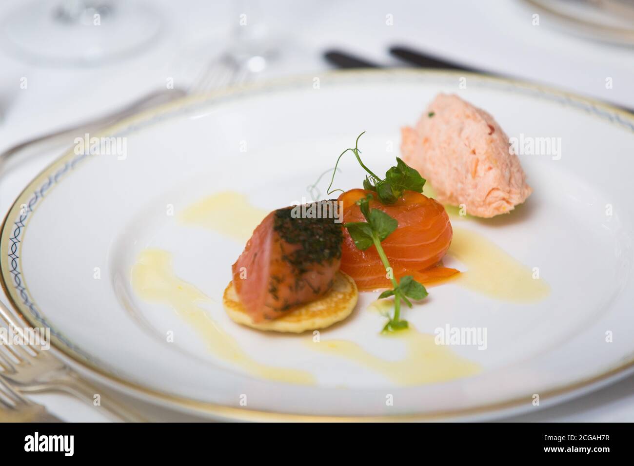 starter smoked salmon three ways Stock Photo - Alamy