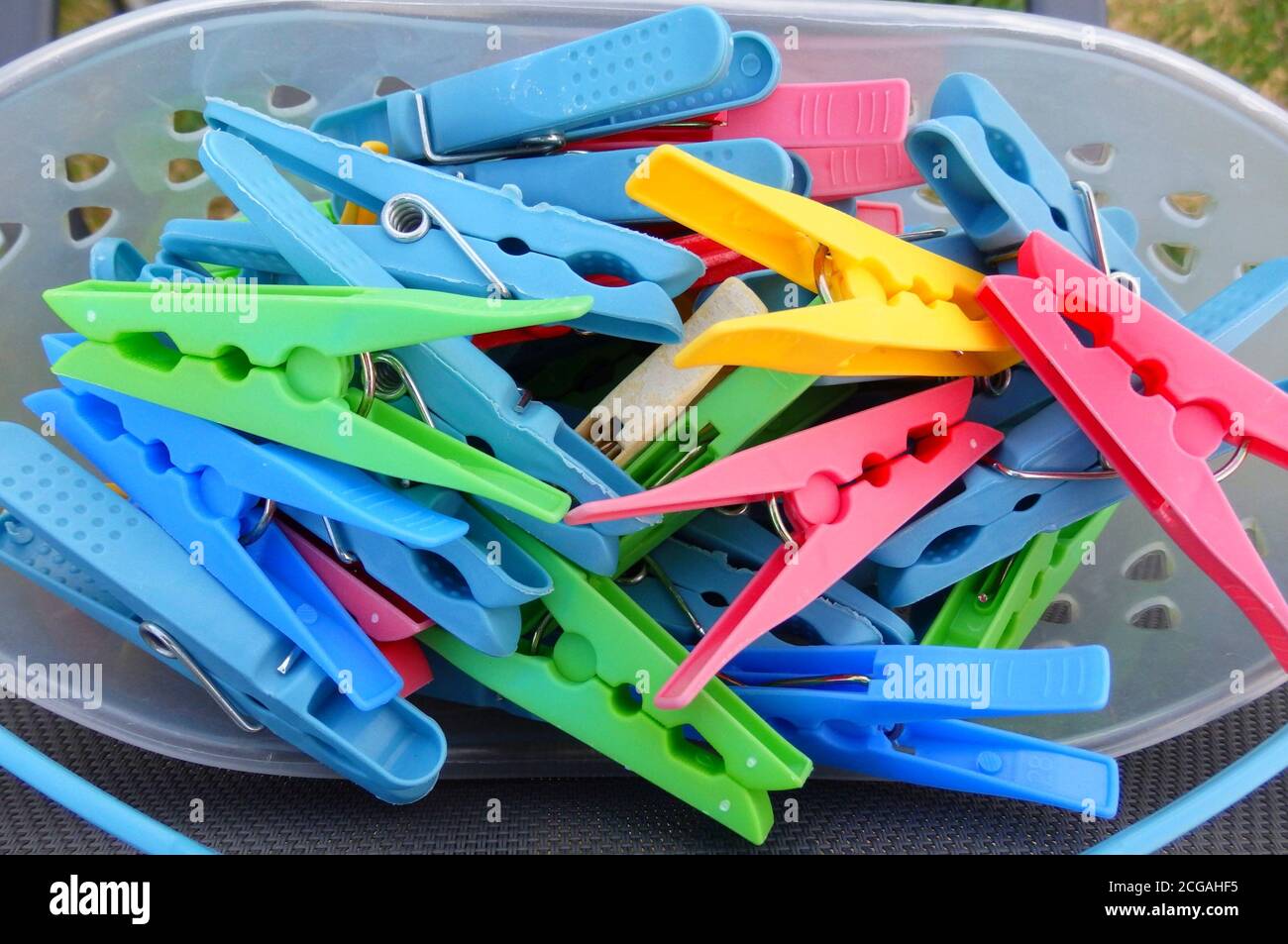 A basket of plastic clothes pegs, Queensland, Australia Stock Photo