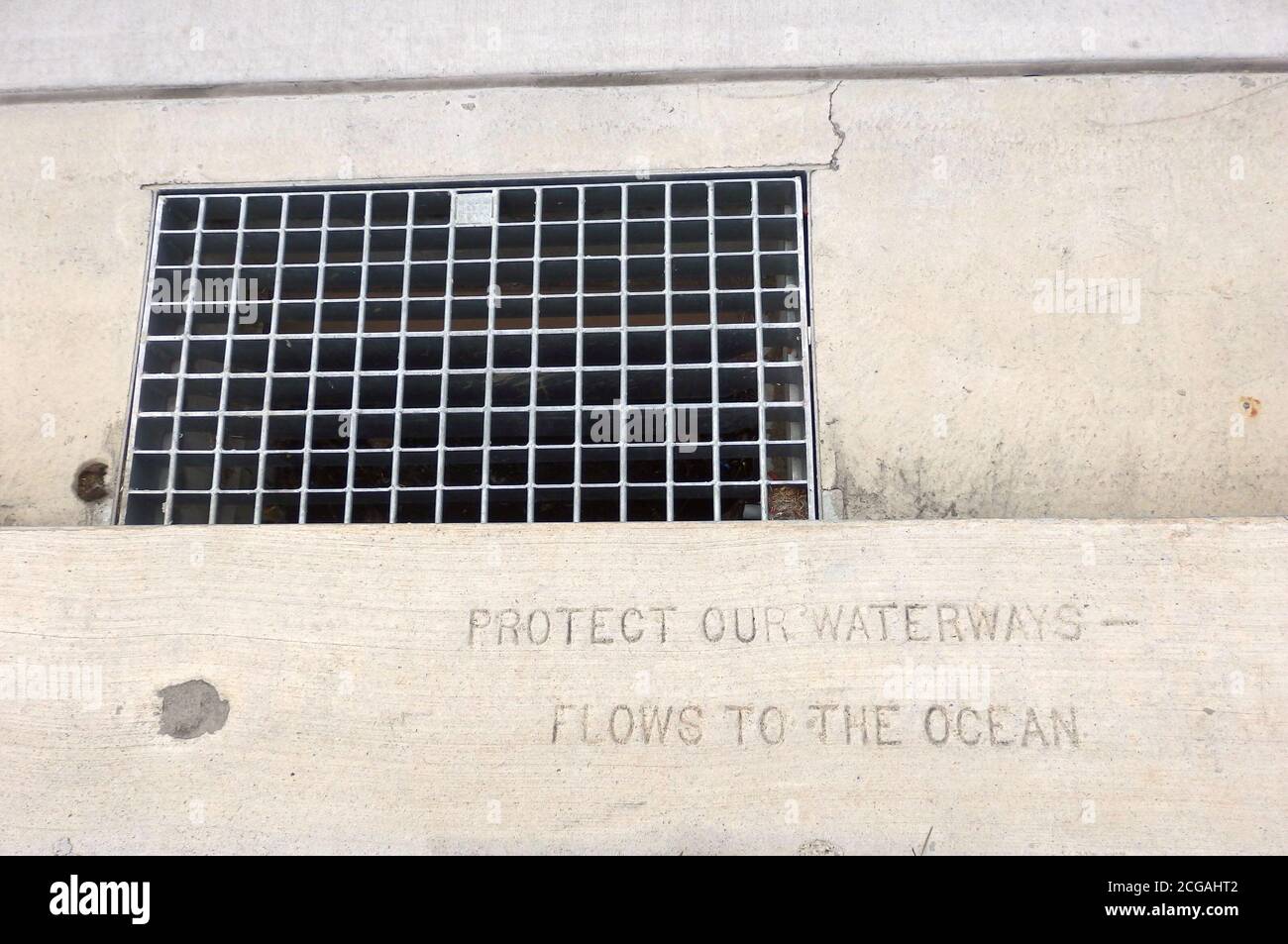 Storm drain grate, with a message to keep our waterways clean, Queensland, Australia Stock Photo