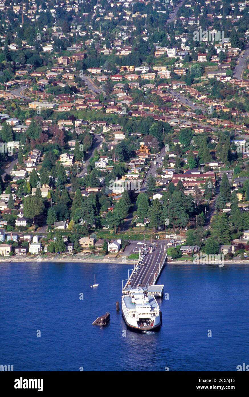 Washington State Ferry arrives at Fauntleroy ferry boat dock, Seattle, Washington Stock Photo